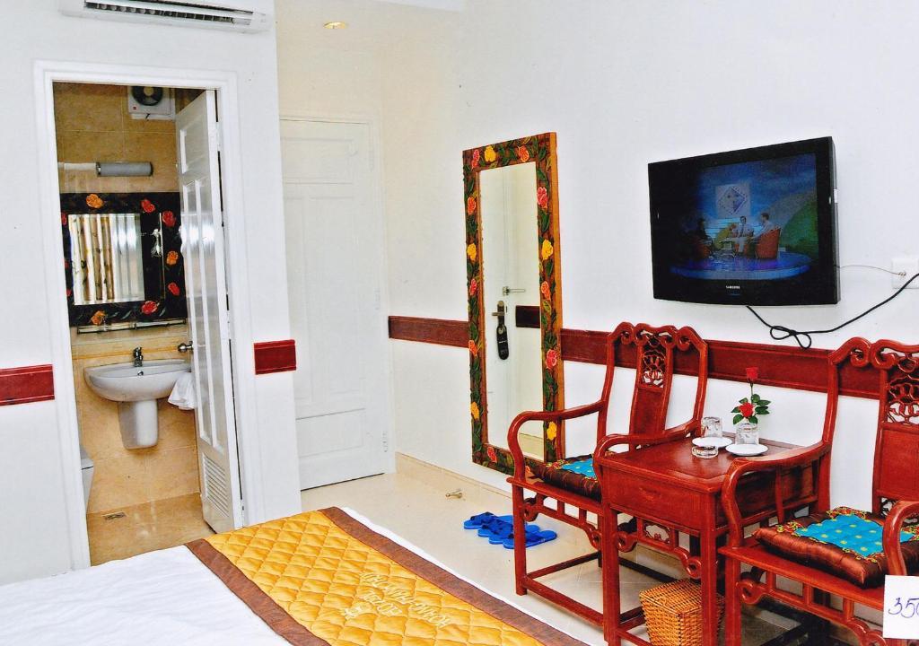 הו צ'י מין סיטי Hoang Thanh Thuy Airport Hotel 1 - Gan Am Thuc Dem Cho Hoang Hoa Tham חדר תמונה